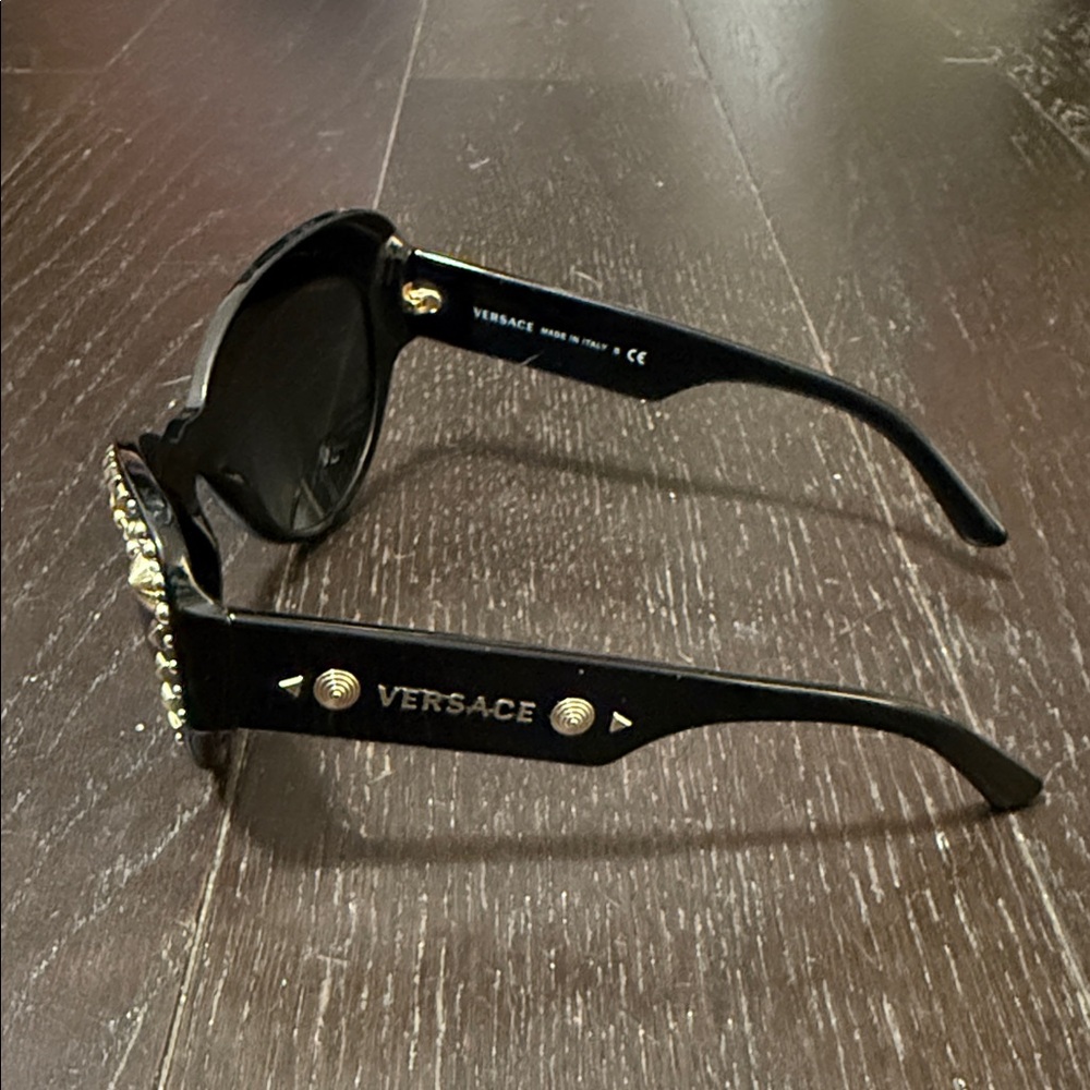 Versace Black Cat-Eye Sunglasses with Gold Stud Accents - Picture 2 of 6
